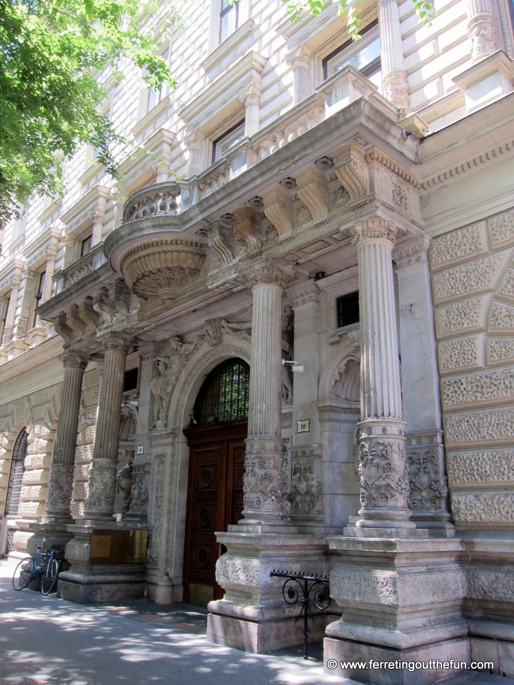 An old stone facade on Andrássy út in Budapest, Hungary