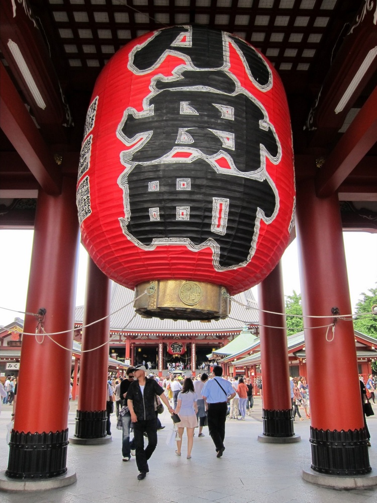 A red lantern hangs above the entrance to Senso-ji Temple in Tokyo, Japan.