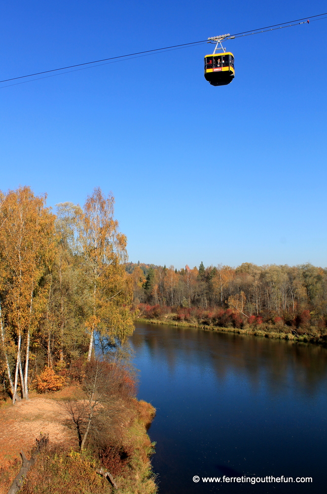 A cable car soars over the Gauja River in Latvia