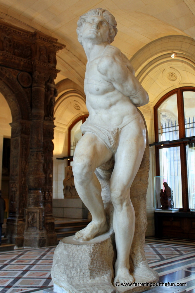 The Rebellious Slave sculpture by Michelangelo // the Louvre, Paris