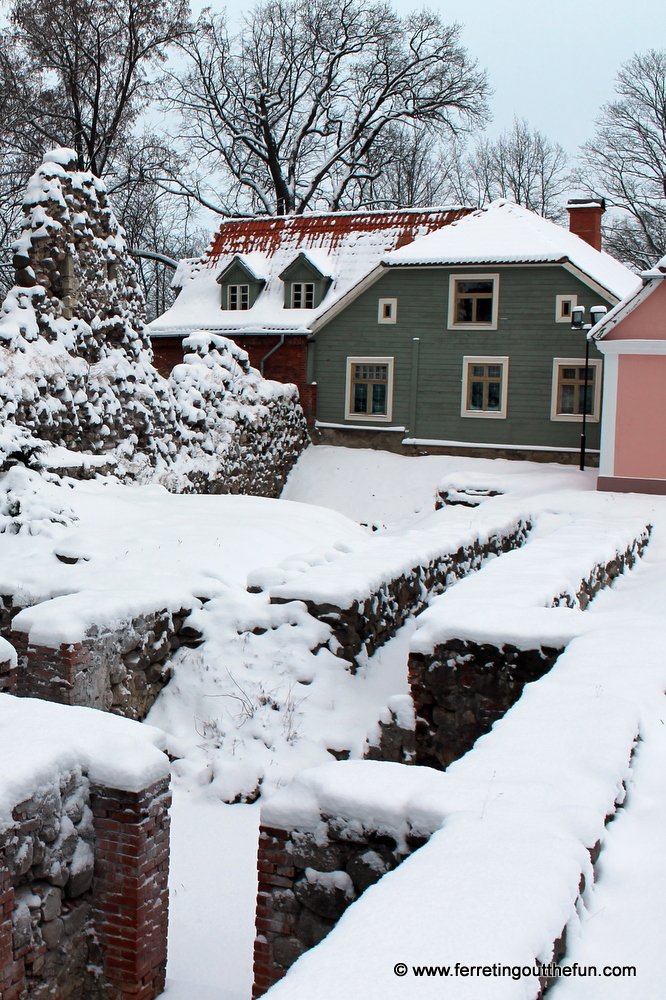 Snow covered medieval castle ruins in Valmiera, Latvia