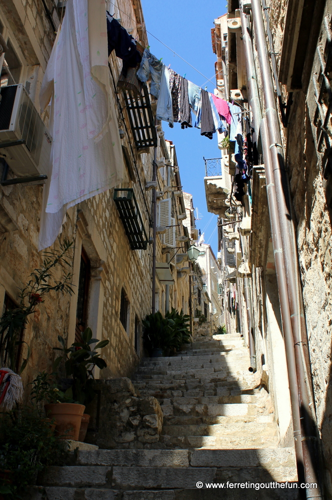 Laundry hangs above a steep alley in Dubrovnik, Croatia