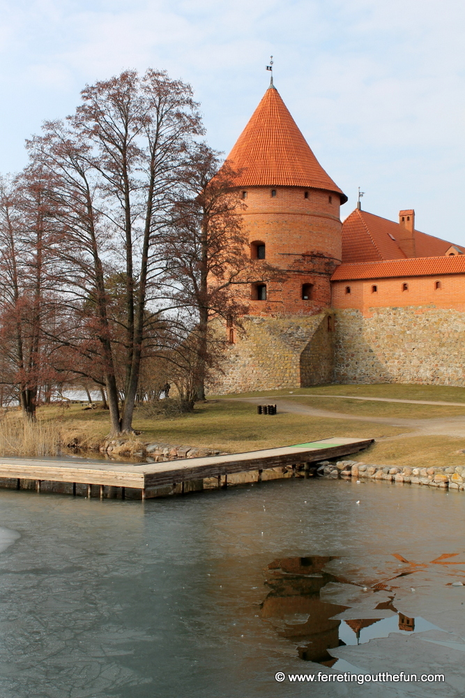 Trakai Castle on the banks of a frozen lake in Lithuania