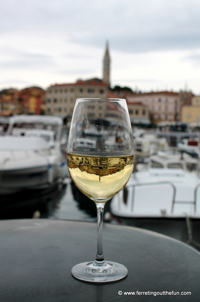 Rovinj, Croatia reflected in a glass of white wine