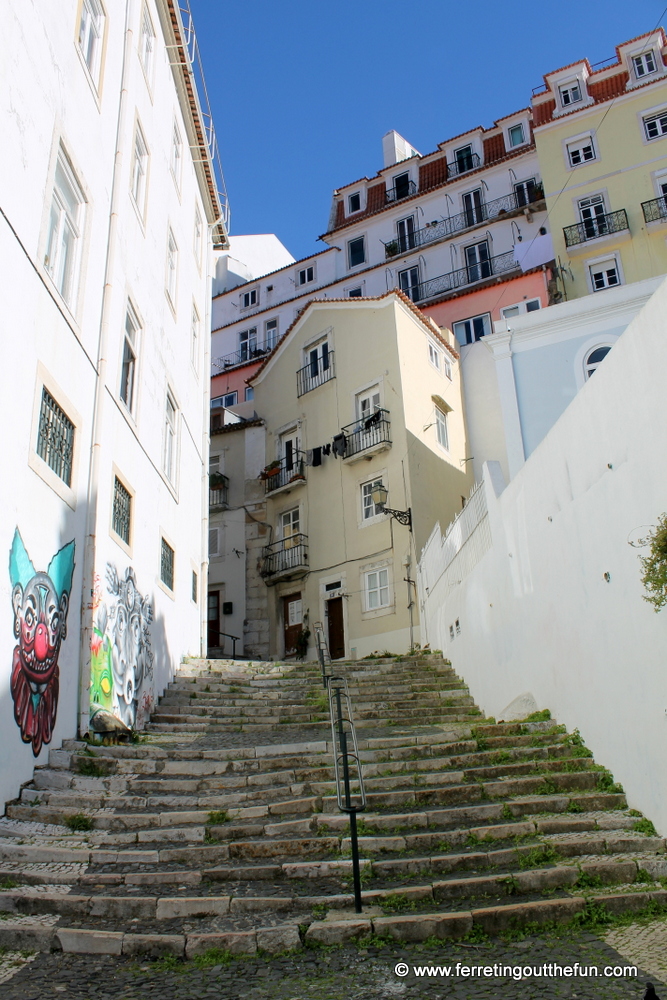 Stairs and street art in the Alfama district of Lisbon, Portugal.
