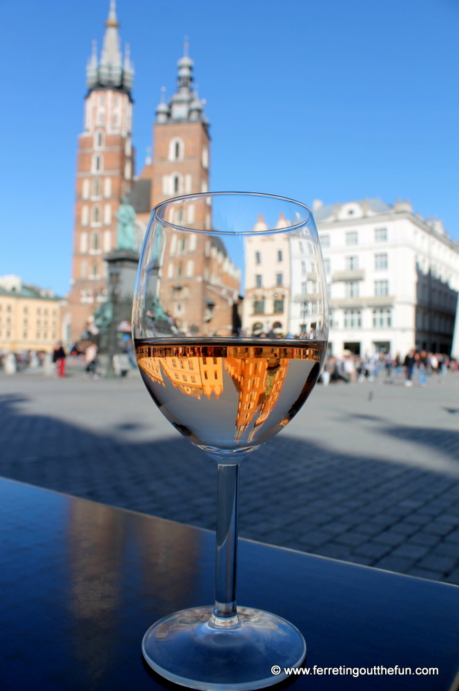 St Marys Basilica reflected in a wine glass in Krakow, Poland