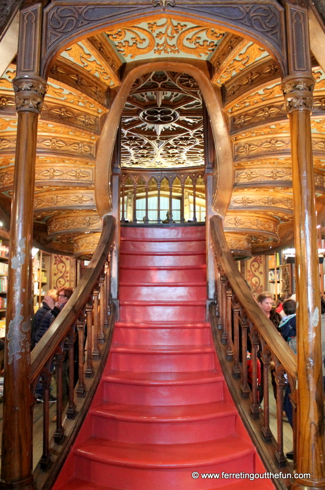 The grand wooden staircase of the Livraria Lello bookstore in Porto, Portugal