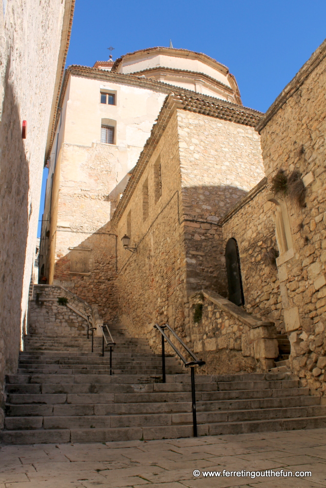 An old church blends into the stones of Cuenca, Spain