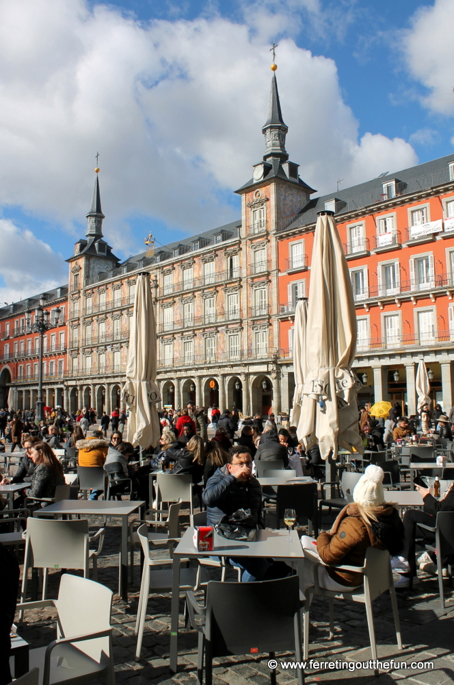 Enjoying a drink and some sunshine in Madrid's pretty Plaza Mayor