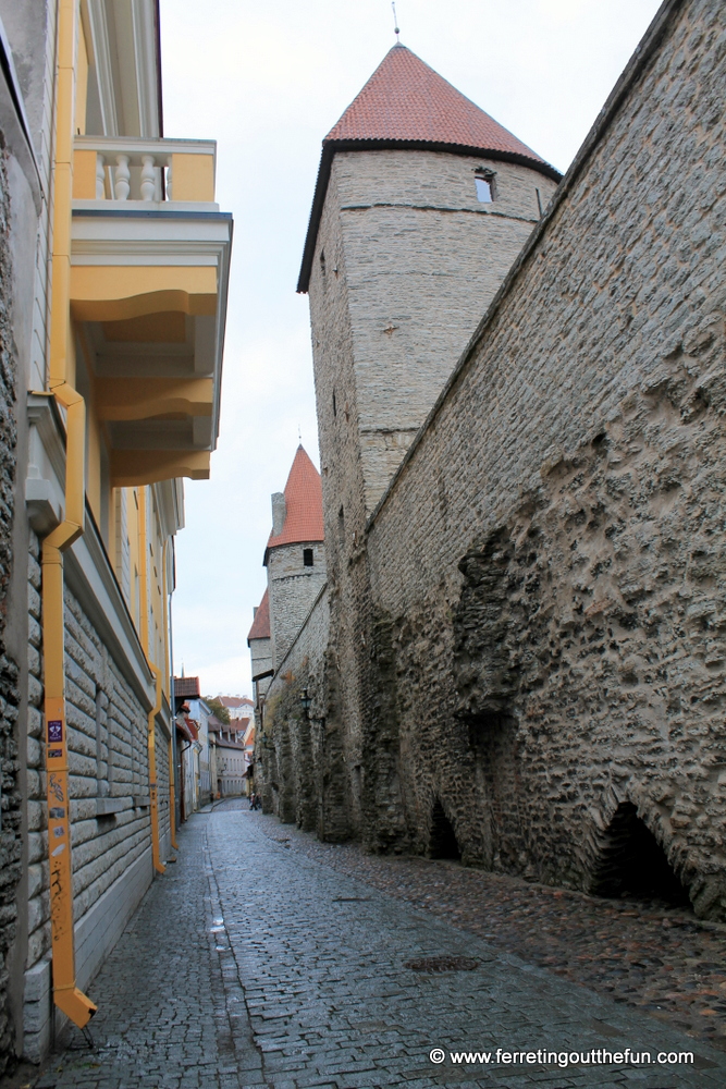 Strolling along the medieval walls of Tallinn, Estonia