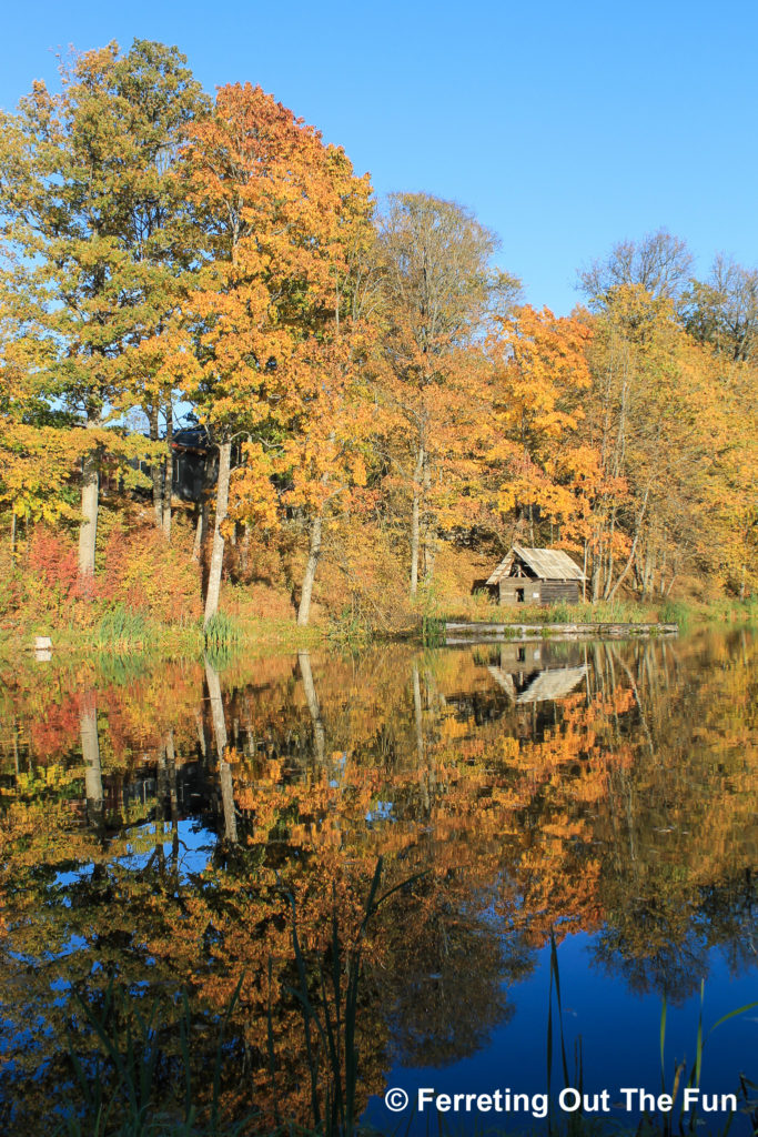 Stunning autumn colors reflected in a lake in Latvia