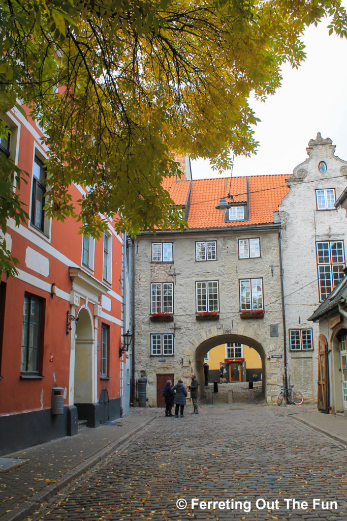 Autumn leaves cover a medieval alley in Riga, Latvia