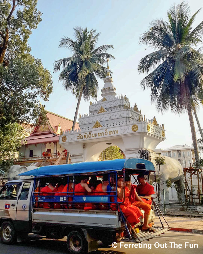 Monks hitching a ride in Vientiane, Laos