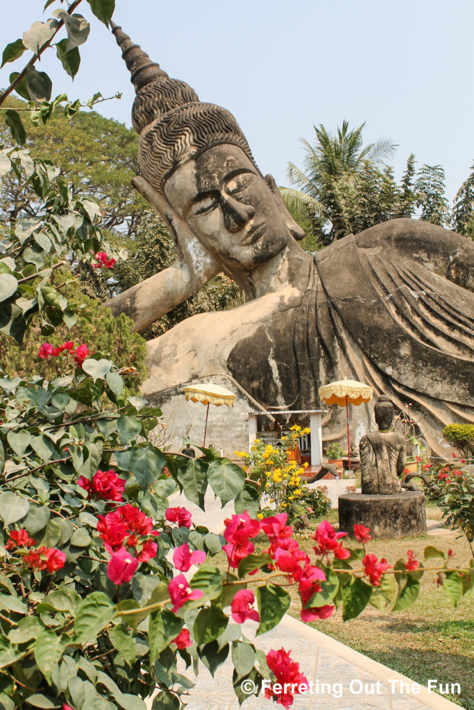 A reclining Buddha sleeps peacefully at the Buddha Park in Vientiane, Laos