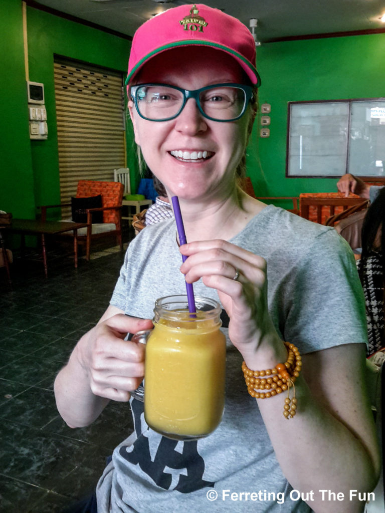 Enjoying a mango smoothie at the House of Fruit Shakes in Vientiane, Laos