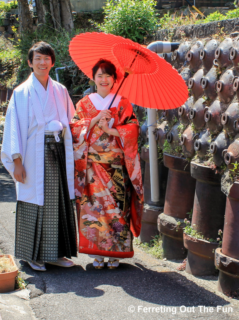 A Japanese couple having their wedding photos done at the Tokoname Pottery Footpath. I love the bride's gorgeous red kimono!