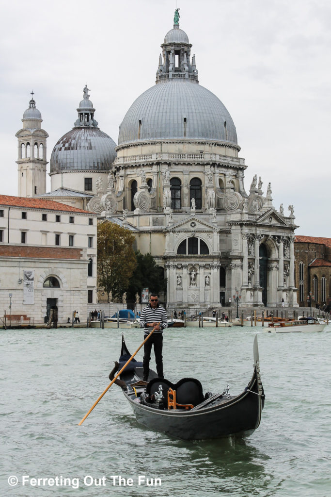 A gondola cruises down the Grand Canal in Venice, Italy