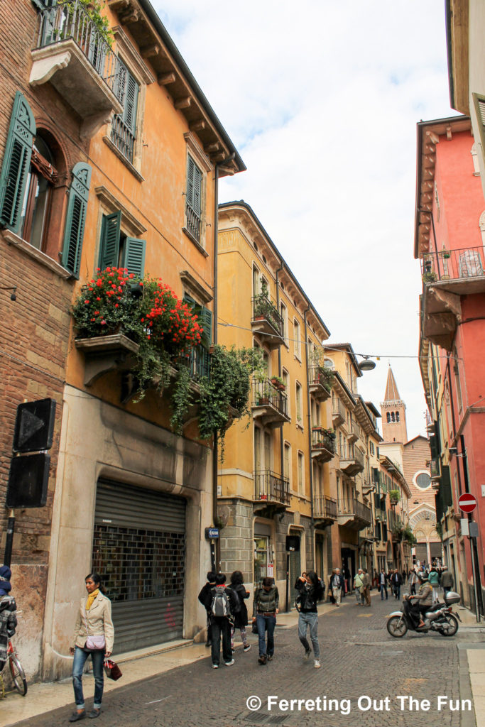 Strolling down a colorful alley in Verona, Italy