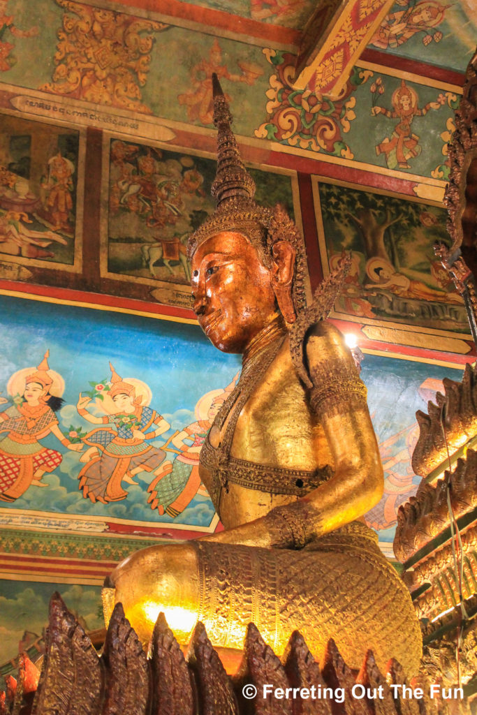 Bronze seated Buddha statue in Wat Phnom, Cambodia