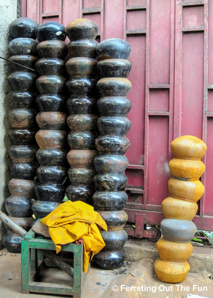 Handmade alms bowls stacked up in Bangkok's Ban Bat Village