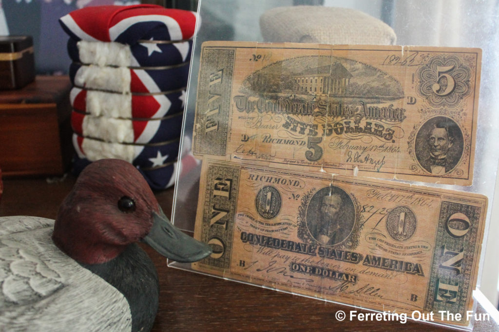 Confederate money and flag wrapped around cotton
