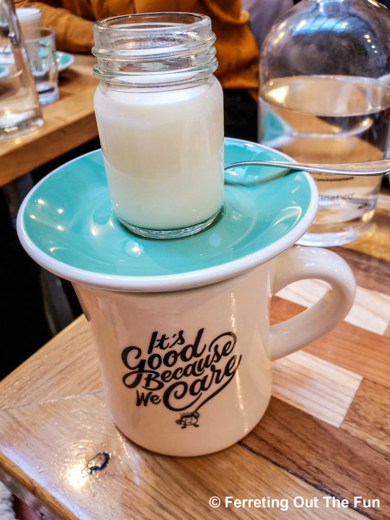 The cutest coffee and milk serving at Holybelly, one of the best places to eat brunch in Paris