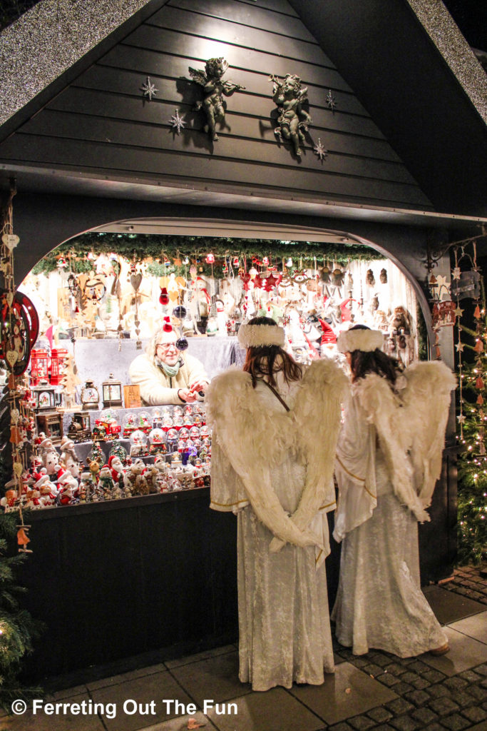 Angels shopping for snow globes at the Cologne Christmas Market