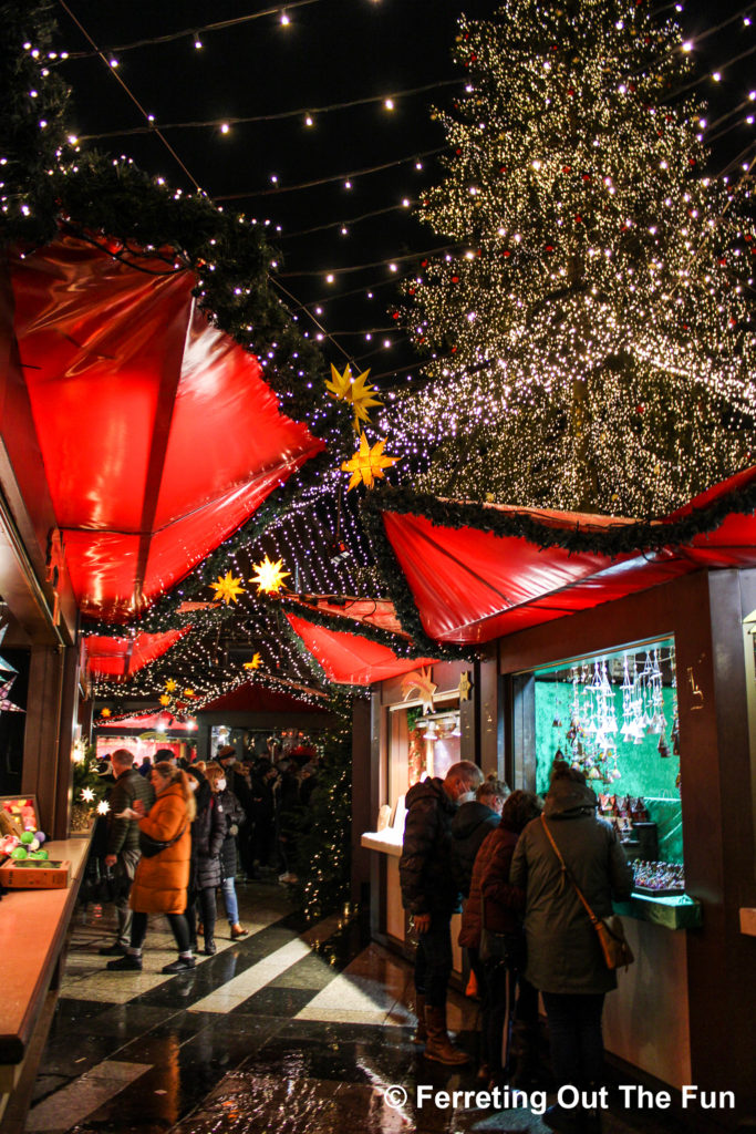 Shopping under a canopy of twinkle lights at the Cologne Christmas Market, Germany