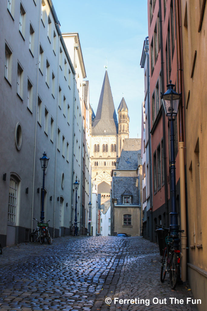 A cobblestone alley in the Altstadt, or Old Town, of Cologne, Germany.