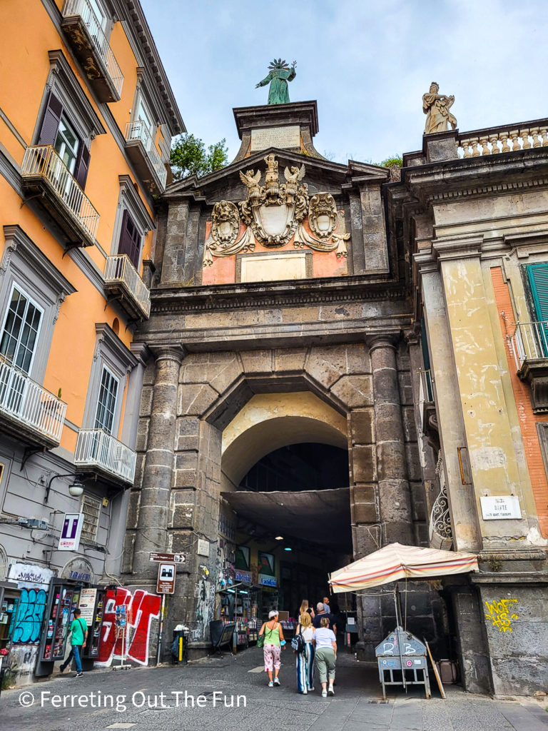 Arched entryway to the historic center of Naples