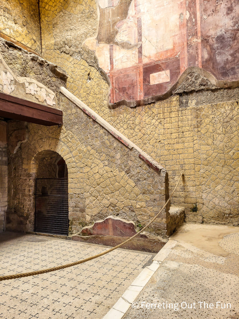Frescos and mosaics in a well preserved ancient building at Herculaneum