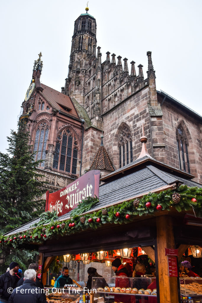 The Nuremberg Christmas Market takes place in the medieval town square, with the Gothic Frauenkirche as the backdrop
