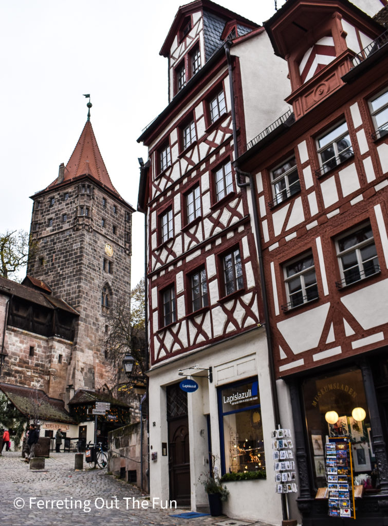 Half-timbered houses and a stone watch tower in the romantic old town of Nuremberg, Germany