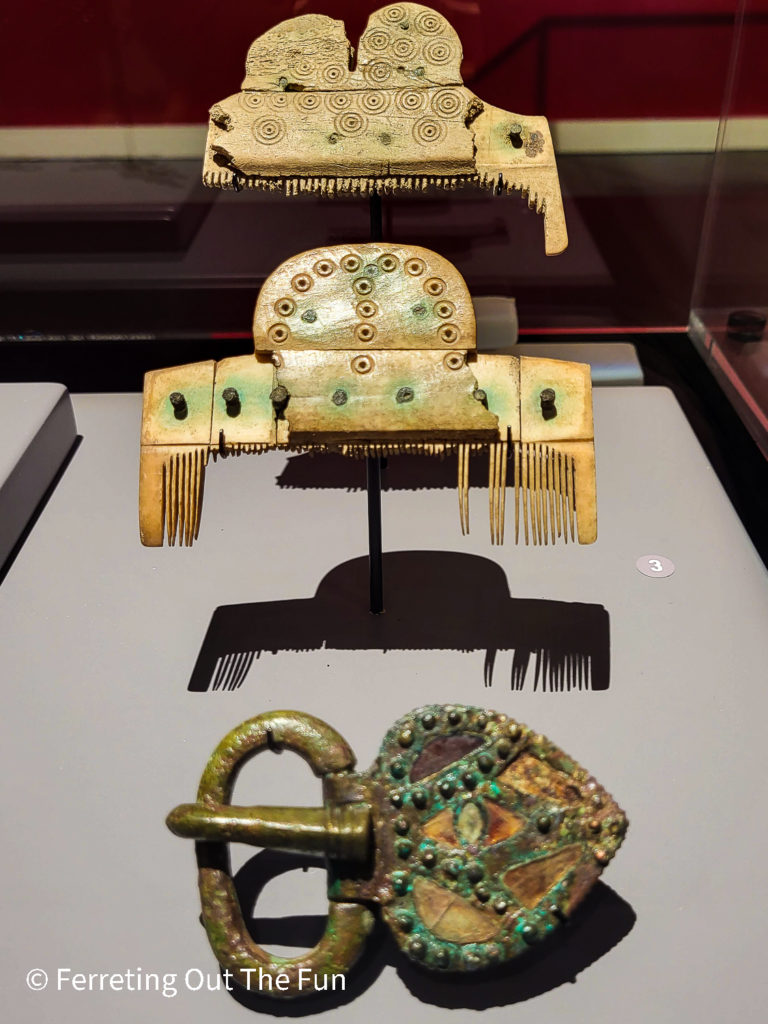 Well-preserved Roman hair combs and belt clasp at the Saint Raymond Museum in Toulouse, France