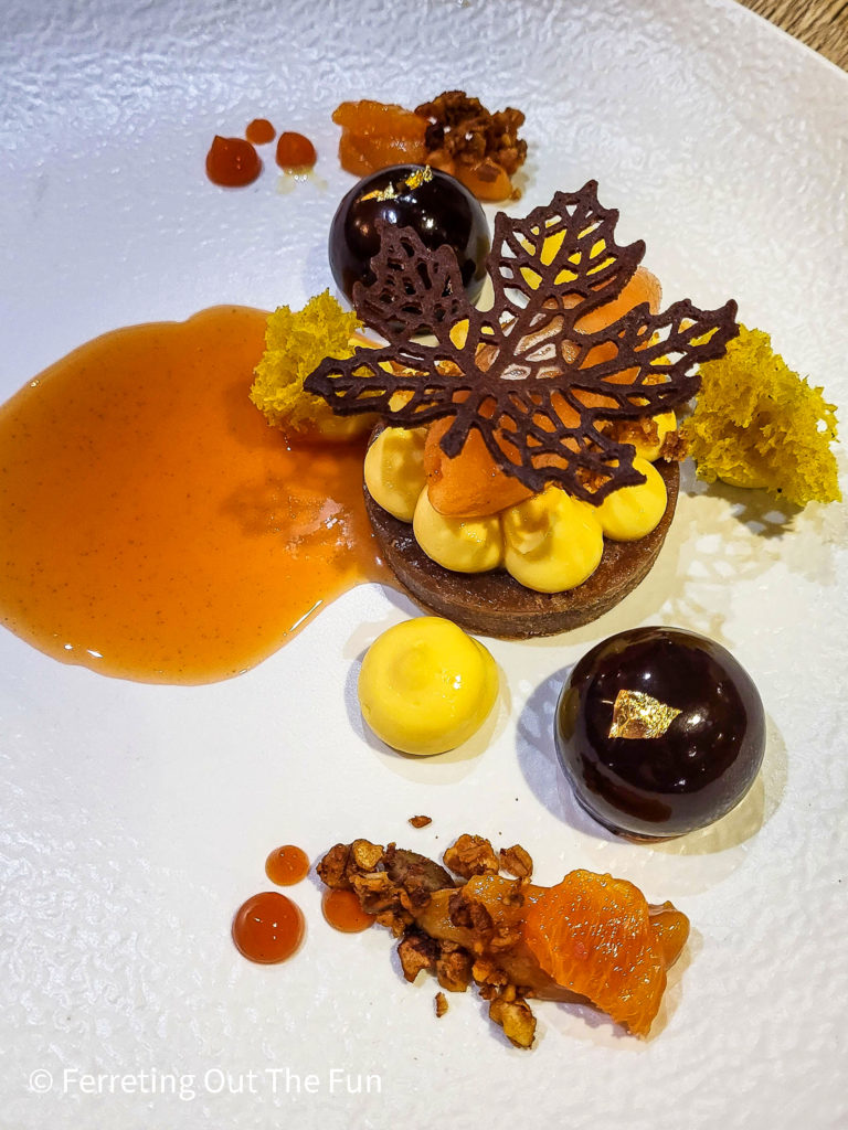 Brown sugar biscuit with mango mousse, blood orange sorbet, and dark chocolate