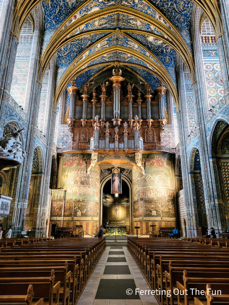 A mural of the Last Judgement sits below a beautiful organ inside Albi Cathedral, France