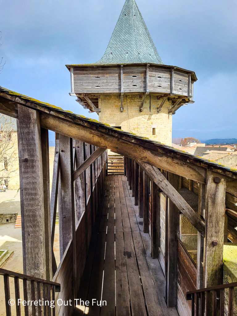 Wooden ramparts and a stone watchtower of Carcassonne Castle, France