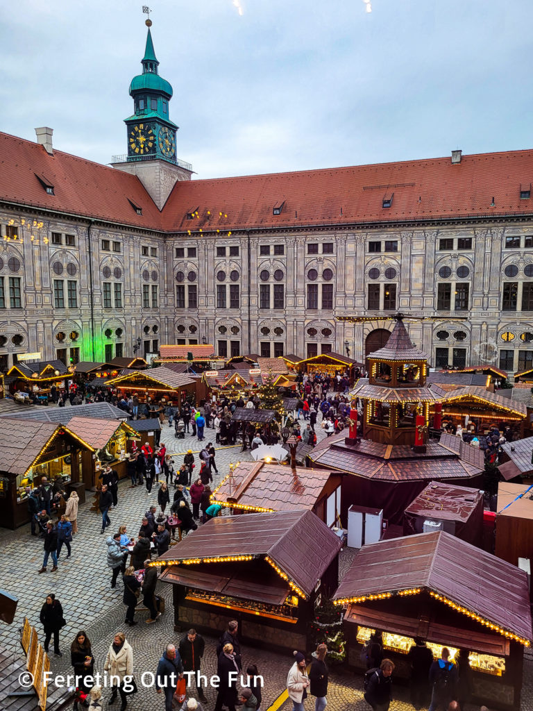 A view of the charming Munich Residenz Christmas Village through the palace ballroom window.