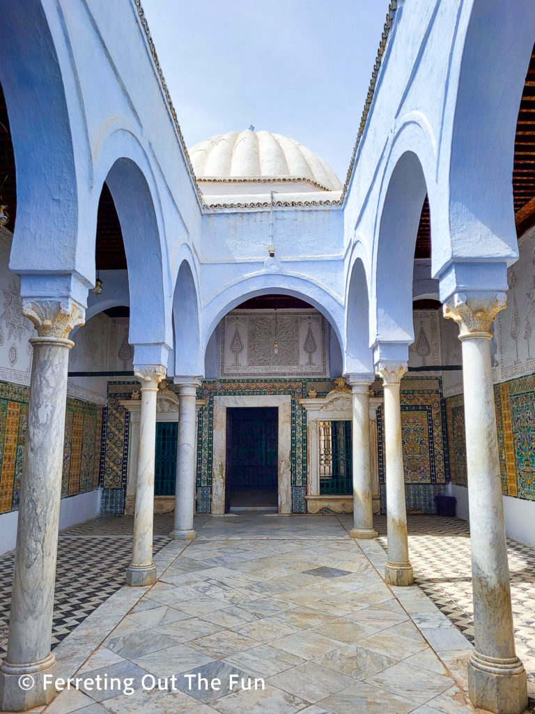 A beautiful tiled hallway leading to the Zaouia of Sidi Sahab in Kairouan, Tunisia