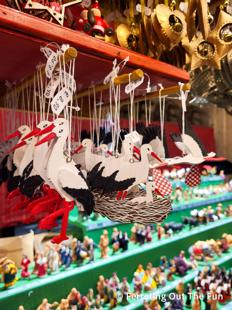 Wooden stork ornaments at the Strasbourg Christmas Market. Storks are the symbol of Alsace.