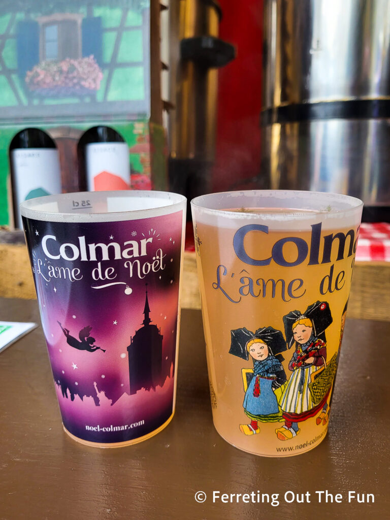 Mulled Alsatian white wine (vin chaud) in cute cups at the Colmar Christmas Market