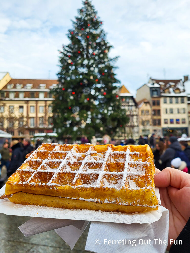 Enjoying a toasty waffle at the Strasbourg Christmas Market