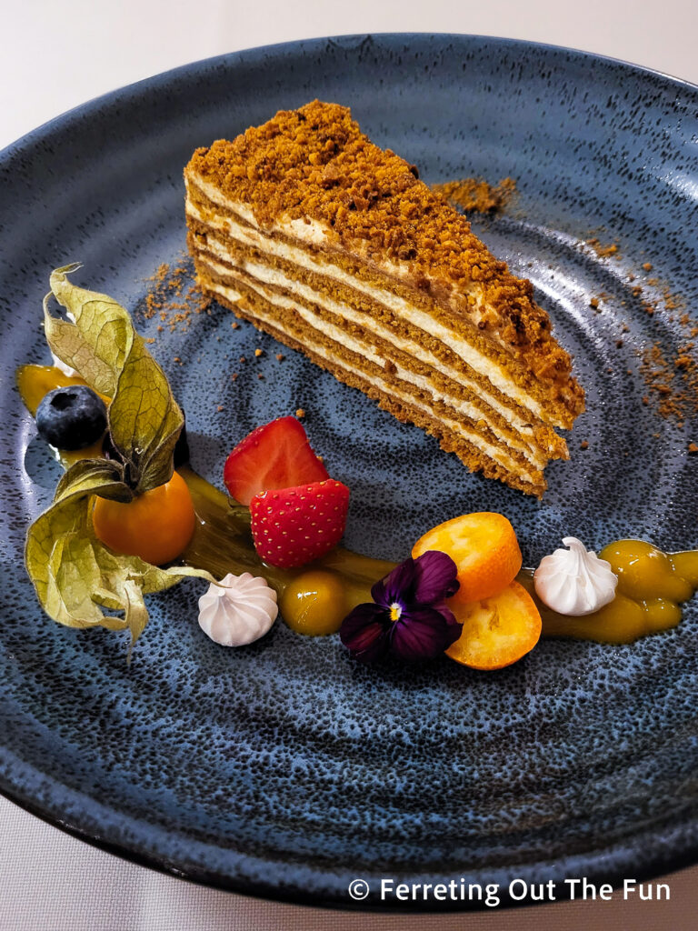 Honey cake with seasonal fruit, a traditional Slavic dessert, at Uncle Vanya in Riga