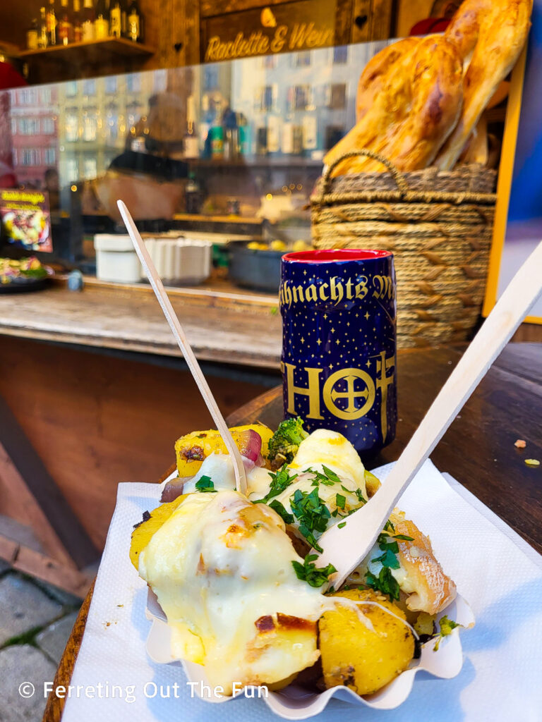 Delicious raclette and mulled wine in a collectible mug at the Am Hof Advent, Market, part of the wonderful Vienna Christmas Market