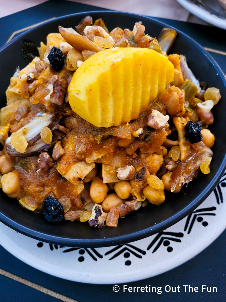 Tunisian chakhchoukha, a traditional southern dish made of semolina bread, chickpeas, sultanas, and spices