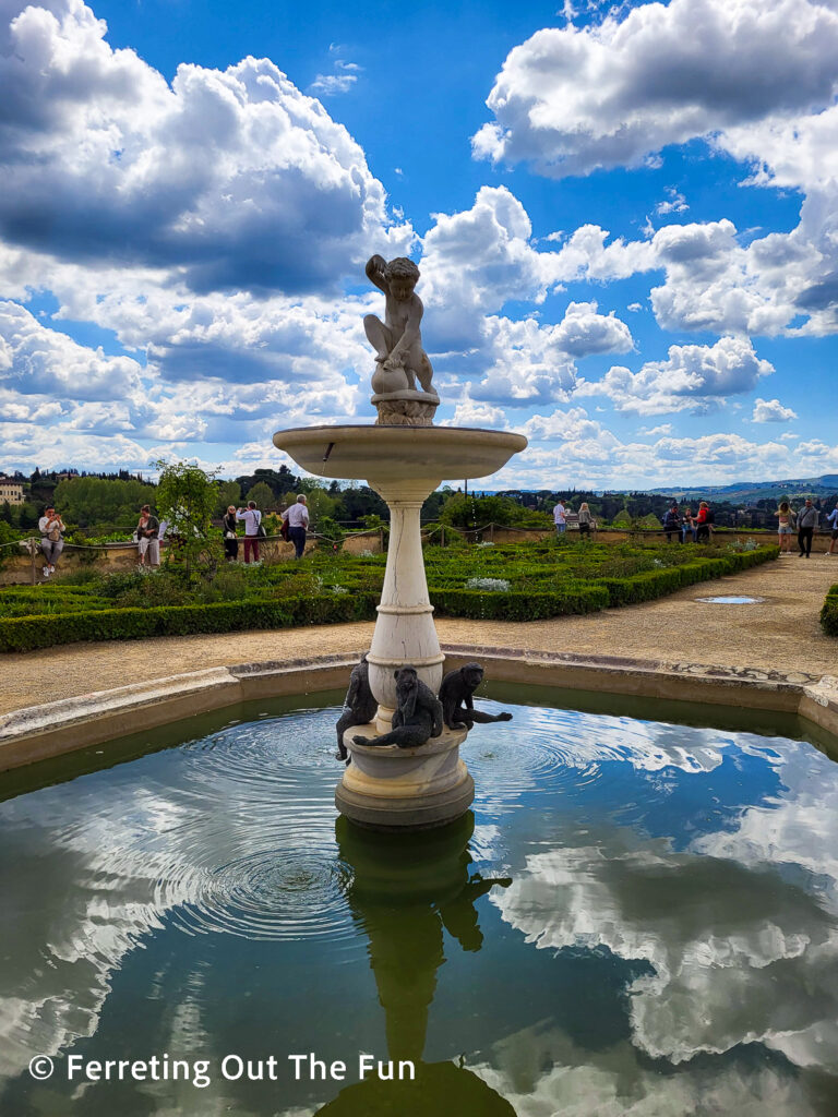 Clouds reflected in a fountain in Boboli Gardens, Florence