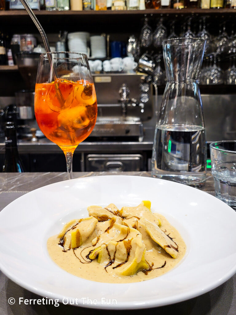Oxtail ravioli with foie gras sauce and fig compote at Roscioli restaurant in Rome
